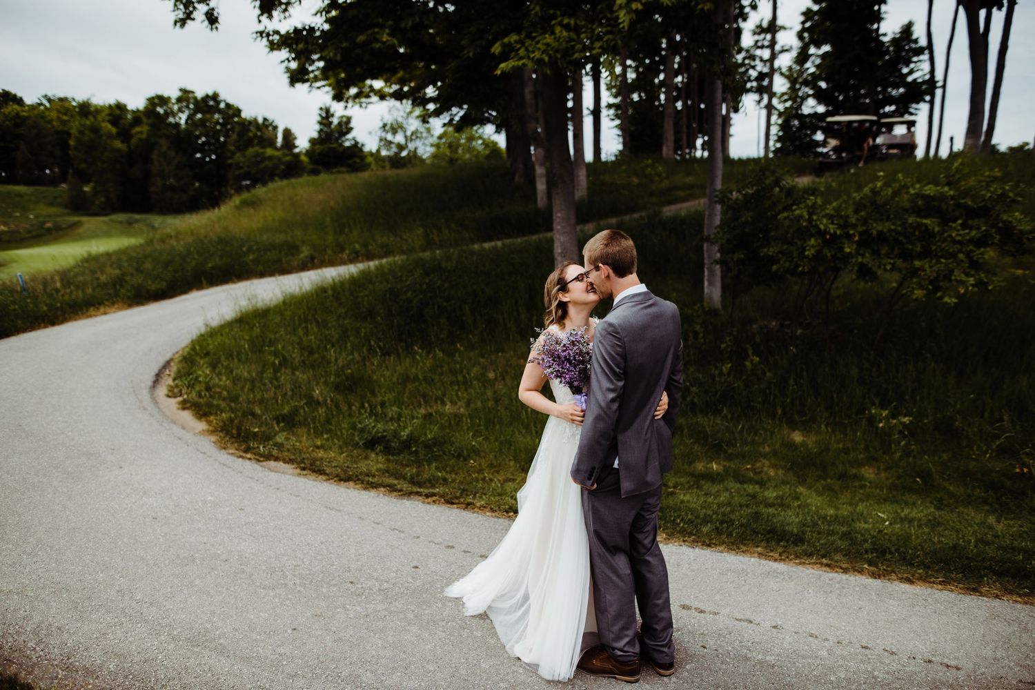First look bride and groom on path
