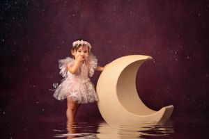 Fine art child photographer Lexington, SC; sitter session baby girl tulle dress, water & reflection, moon, purple
