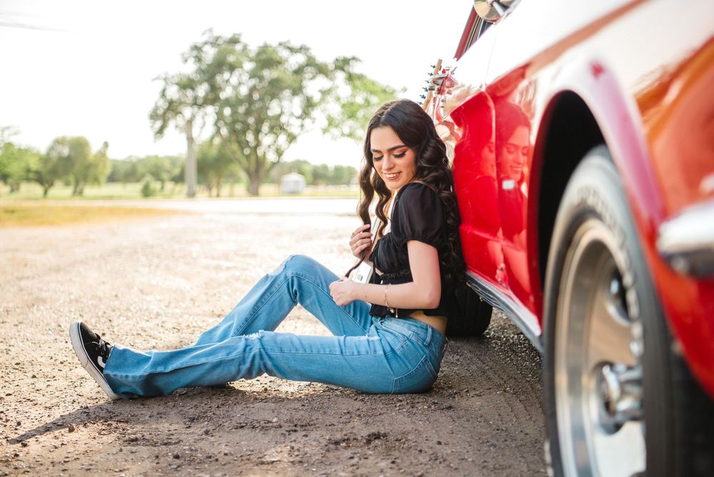 Beautiful girl sitting next to a car. Memory Lane Photo Spot. Mission, Texas