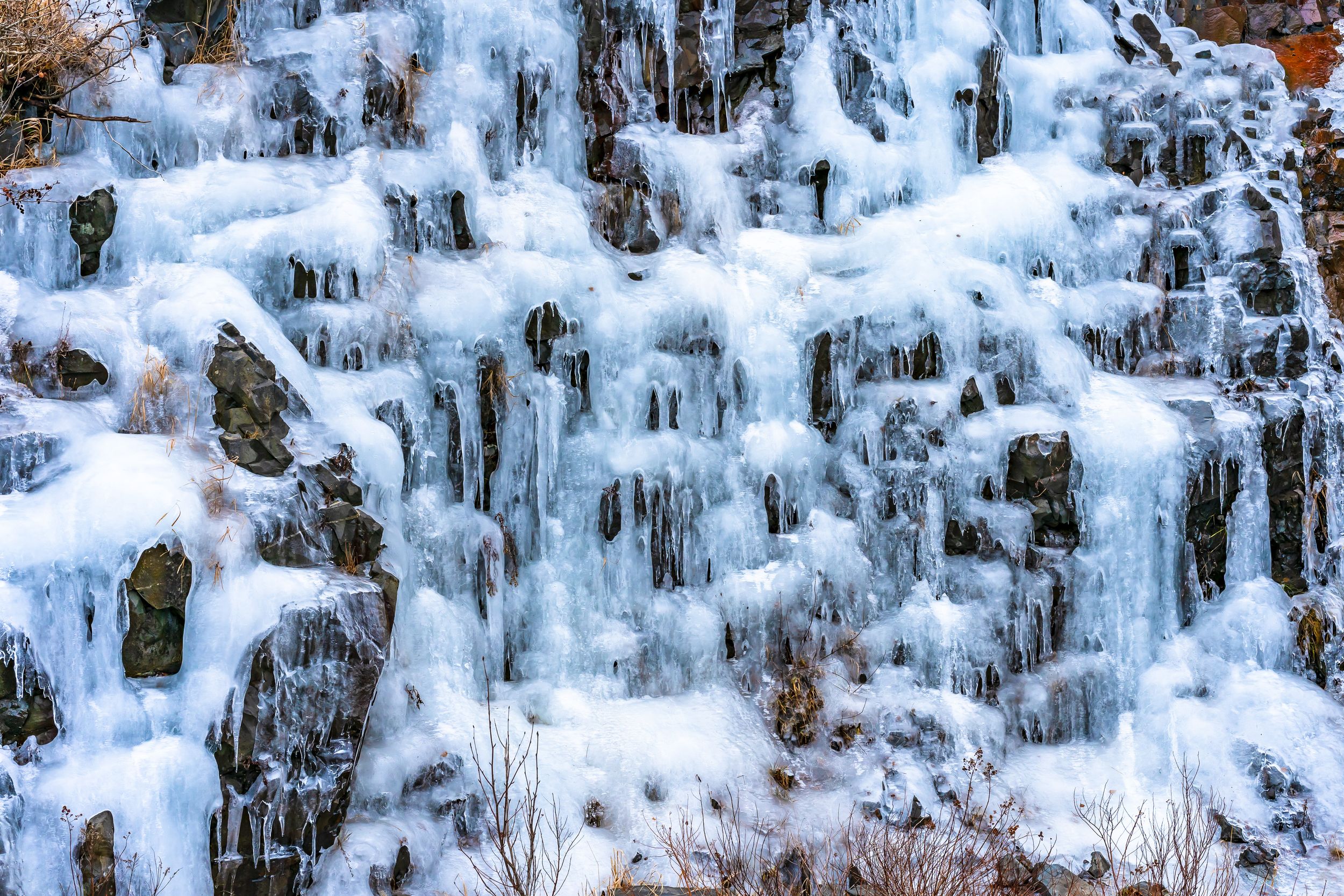 TAKE A CLOSER LOOK AT ICE FORMATIONS ON THE HILL AT WINTER - FORT AMHERST, ST JOHN'S, NEWFOUNDLAND, CANADA