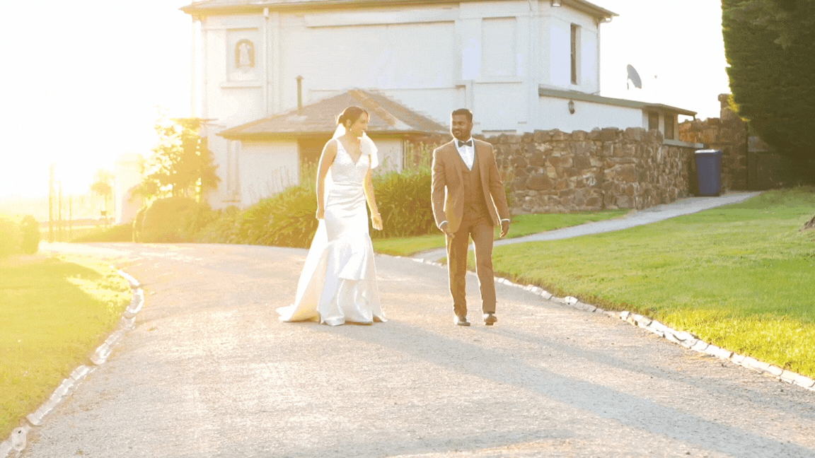 couple holding their hand, walking on the wedding day