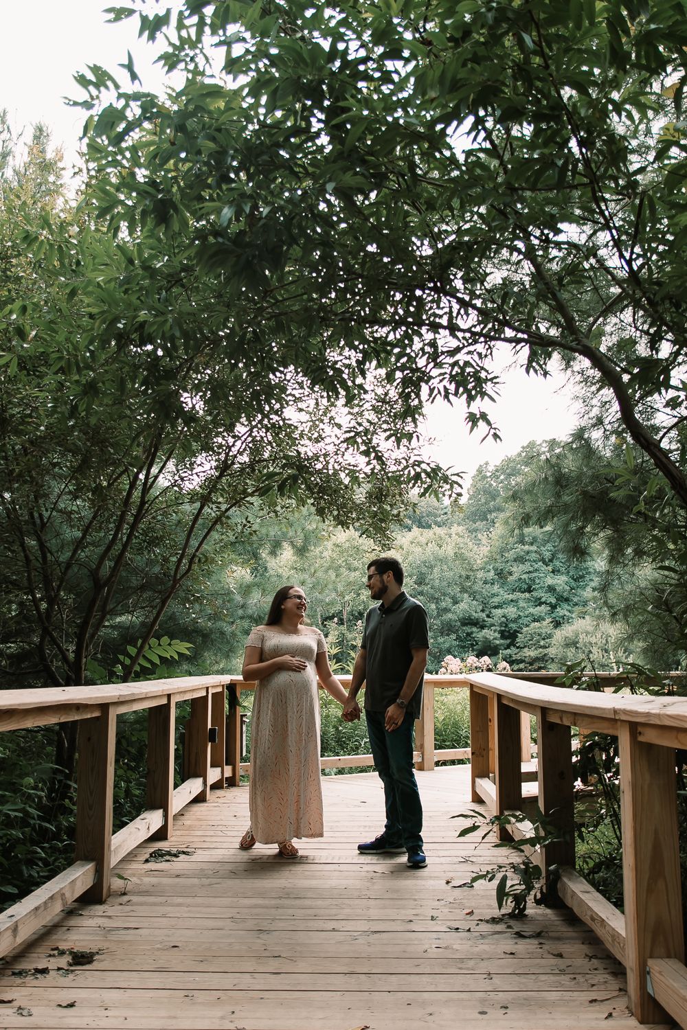 relaxed maternity session park walking pregnancy couple