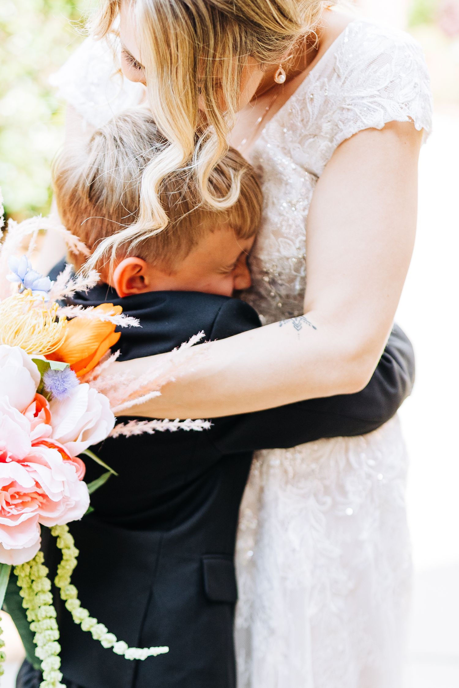 mother and son first look monroe cotton mill wedding
