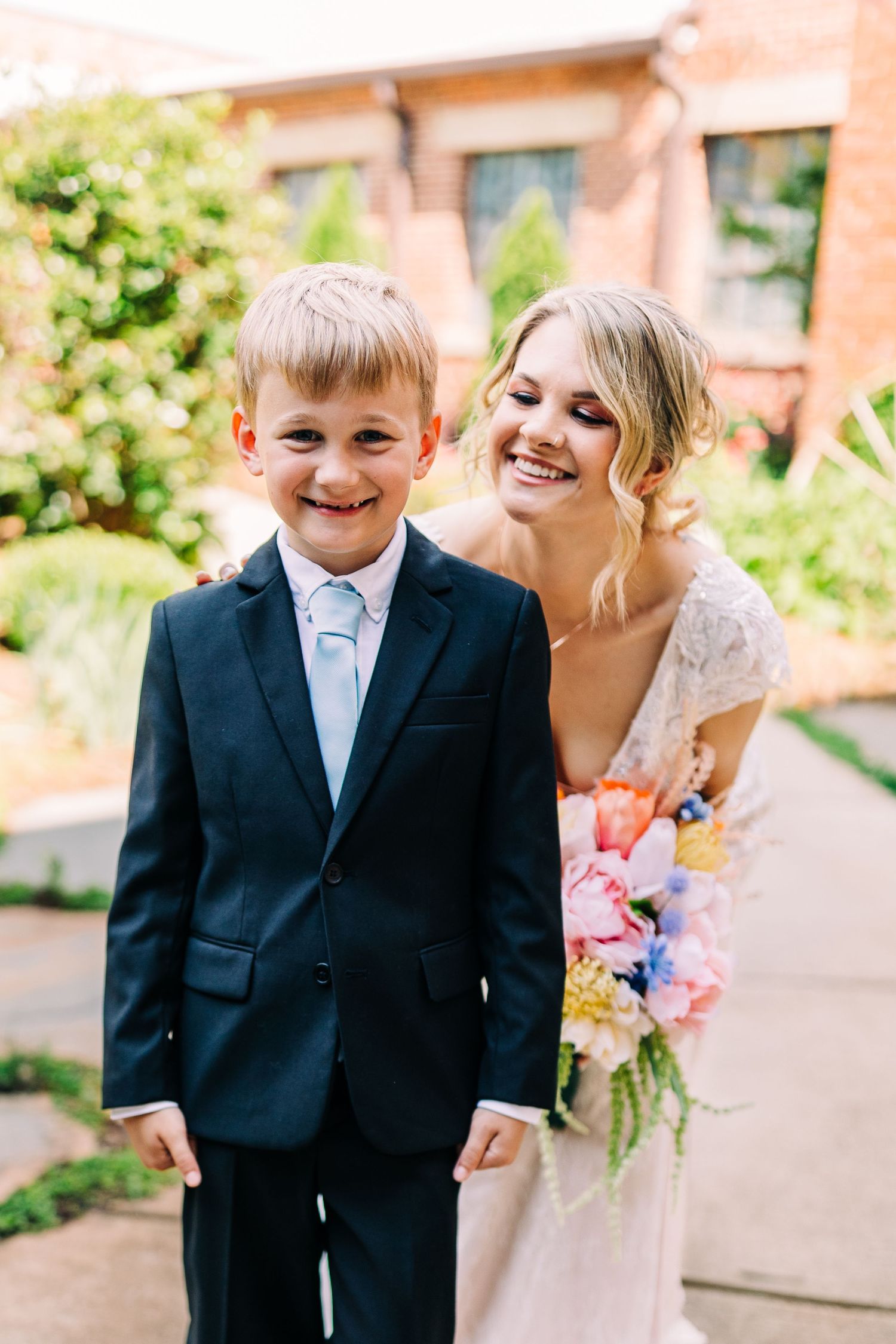 mother and son first look monroe cotton mill wedding