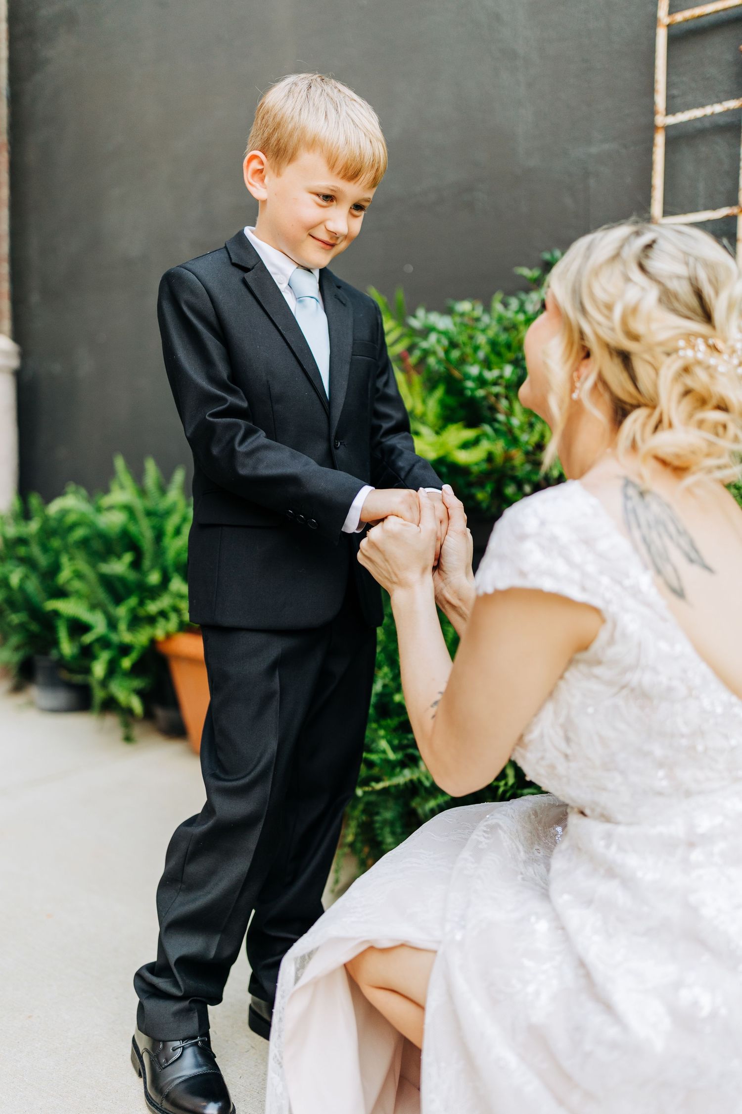 mother and son first look monroe cotton mill wedding