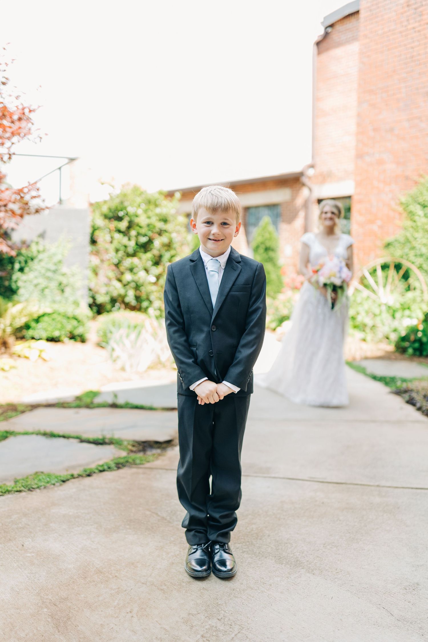 mother and son first look monroe cotton mill wedding