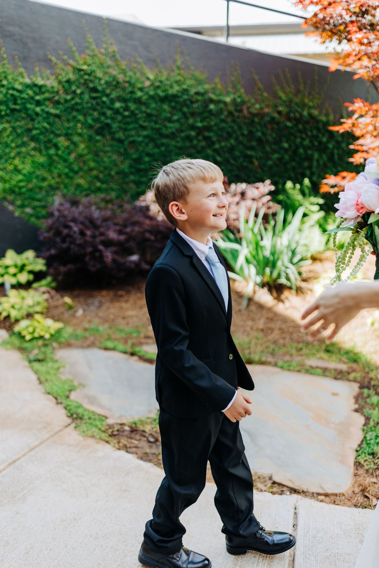 mother and son first look monroe cotton mill wedding