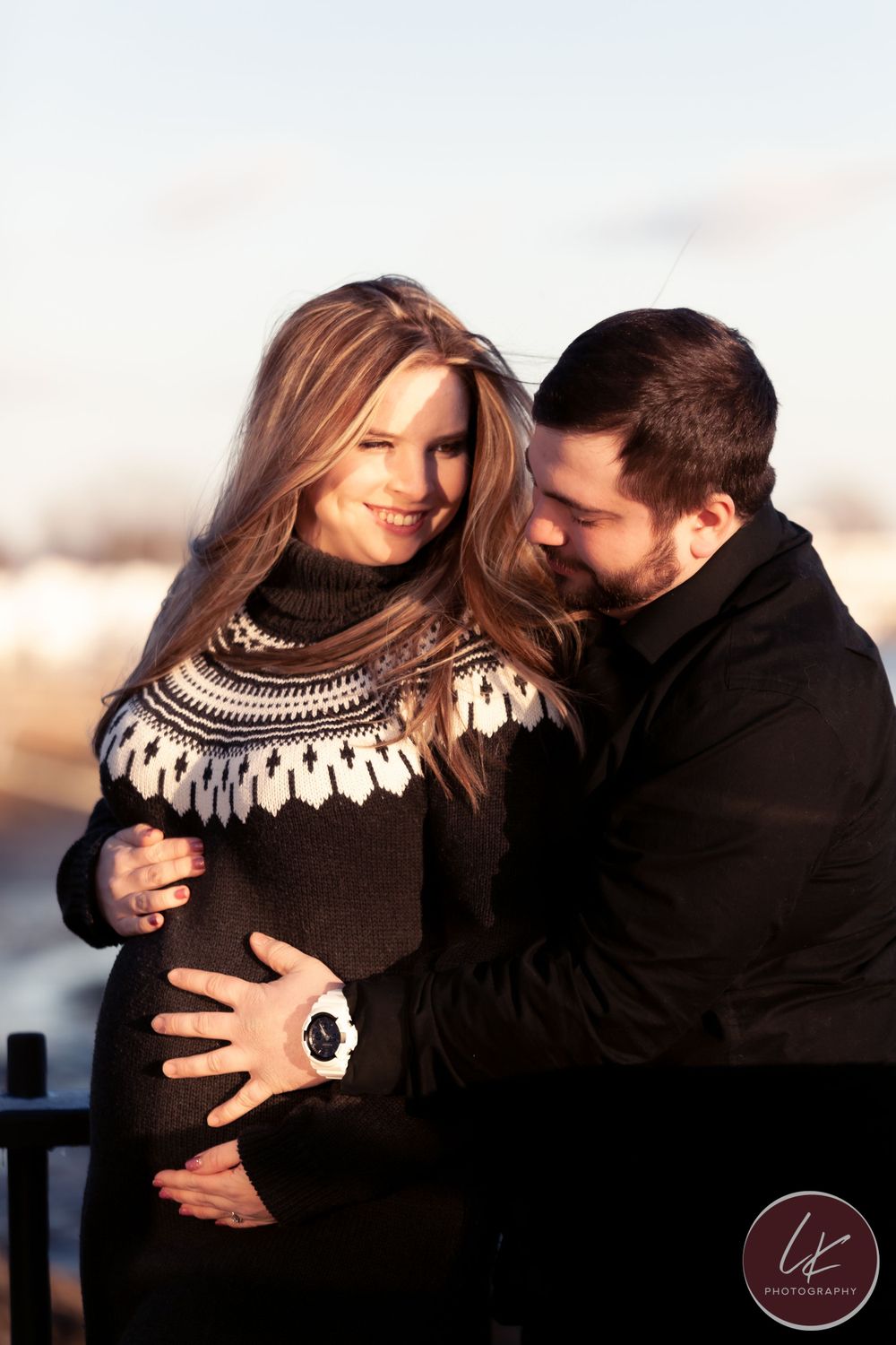 romantic maternity moment with hands on belly