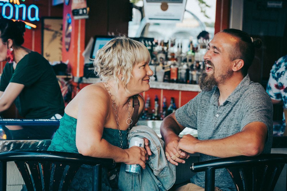 couple talking in bar