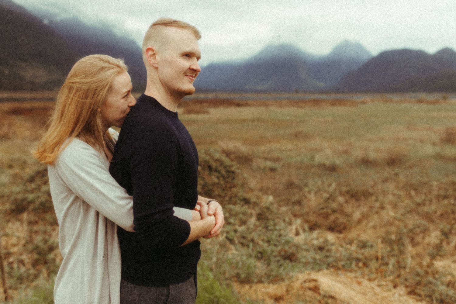 Couple getting engagement photos at Pitt Lake, BC