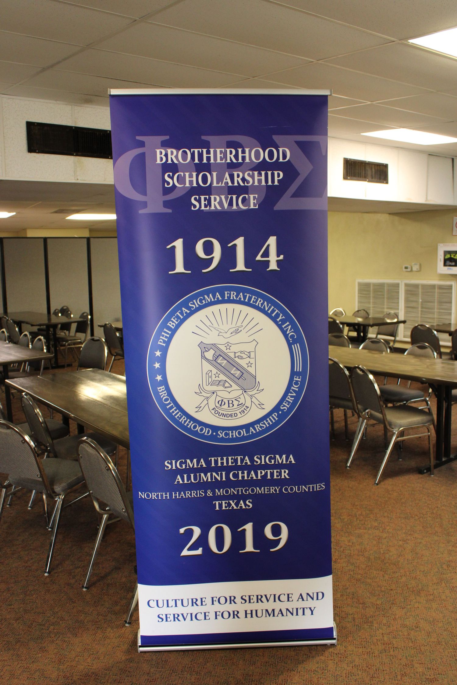 Sigma Theta Sigma Brotherhood Scholarship Service banner displaying organization information from 1914-2019.