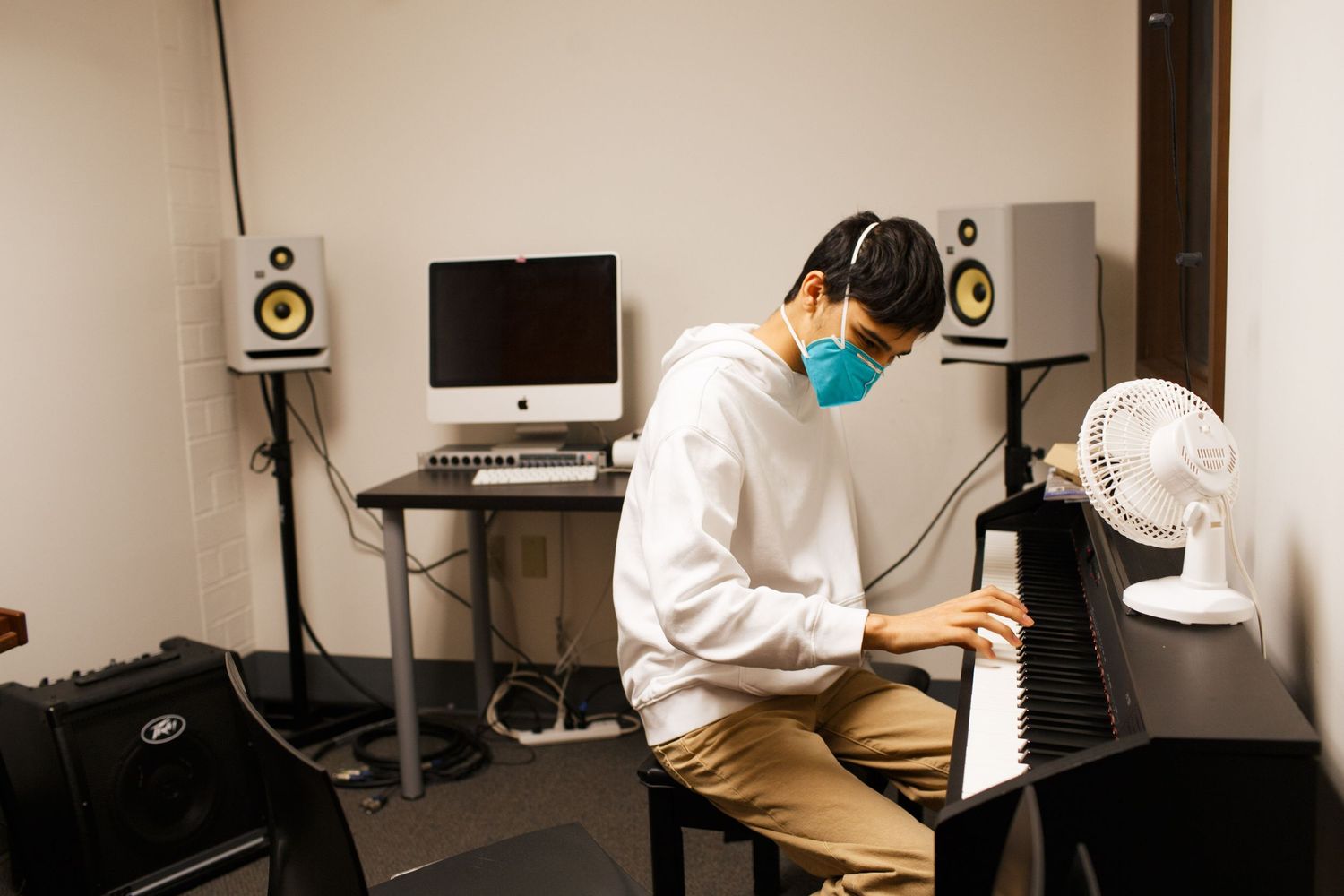 Seattle lifestyle branding: a student plays the Piano at Puget Sound Community School in Seattle