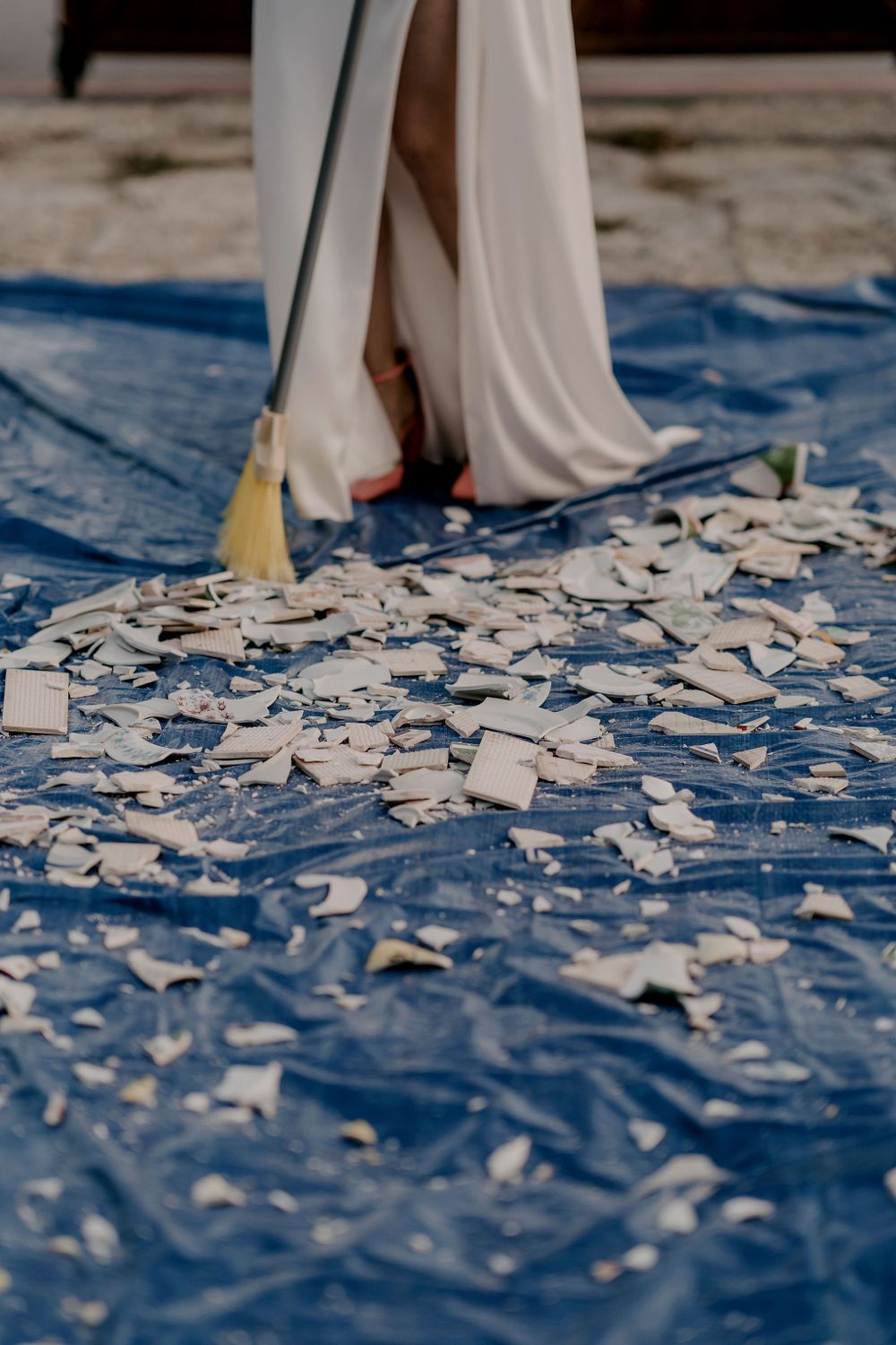 White confetti scattered on blue surface creating celebratory pattern.
