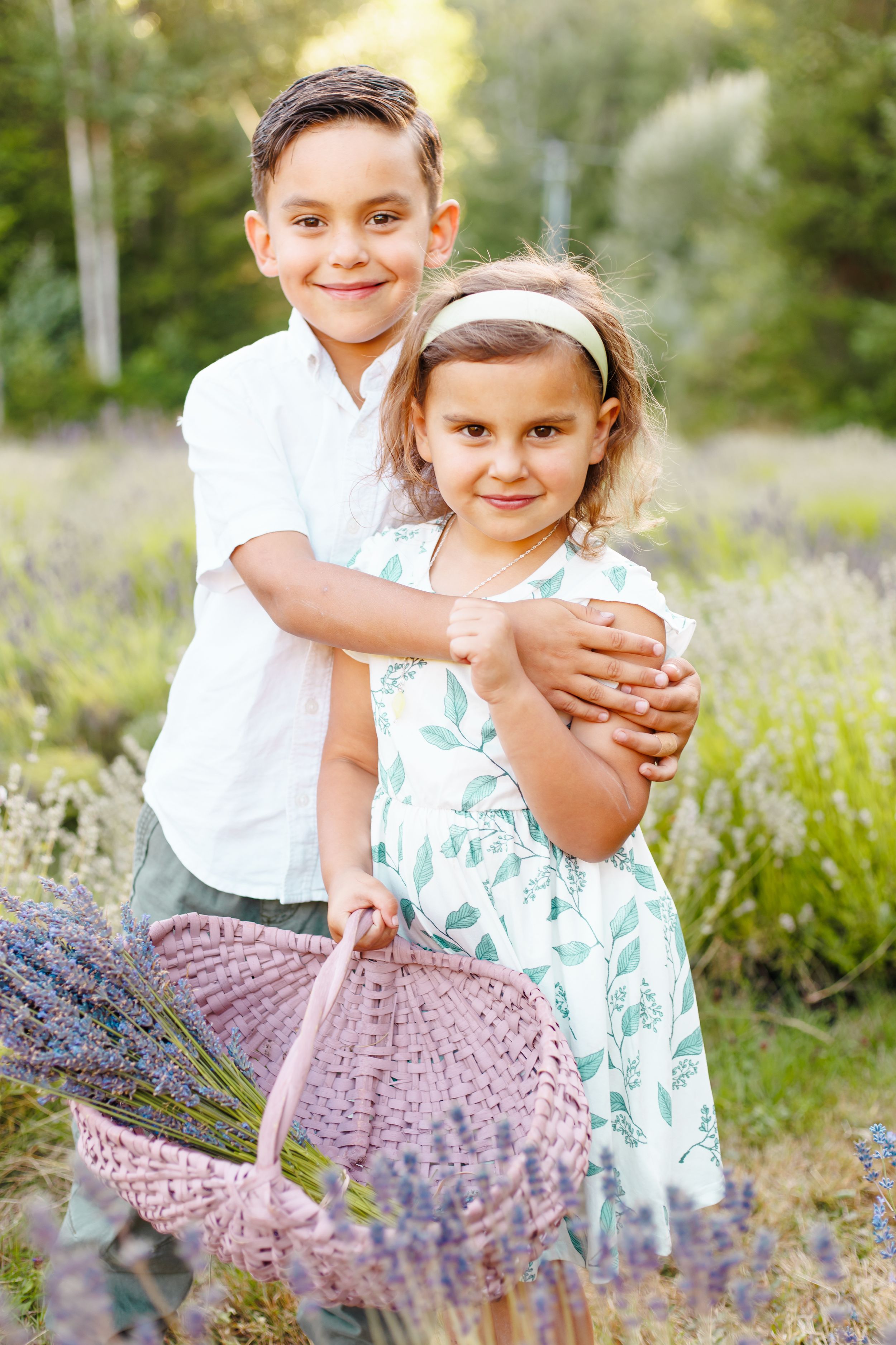 brother and sister playing in the  lavender field