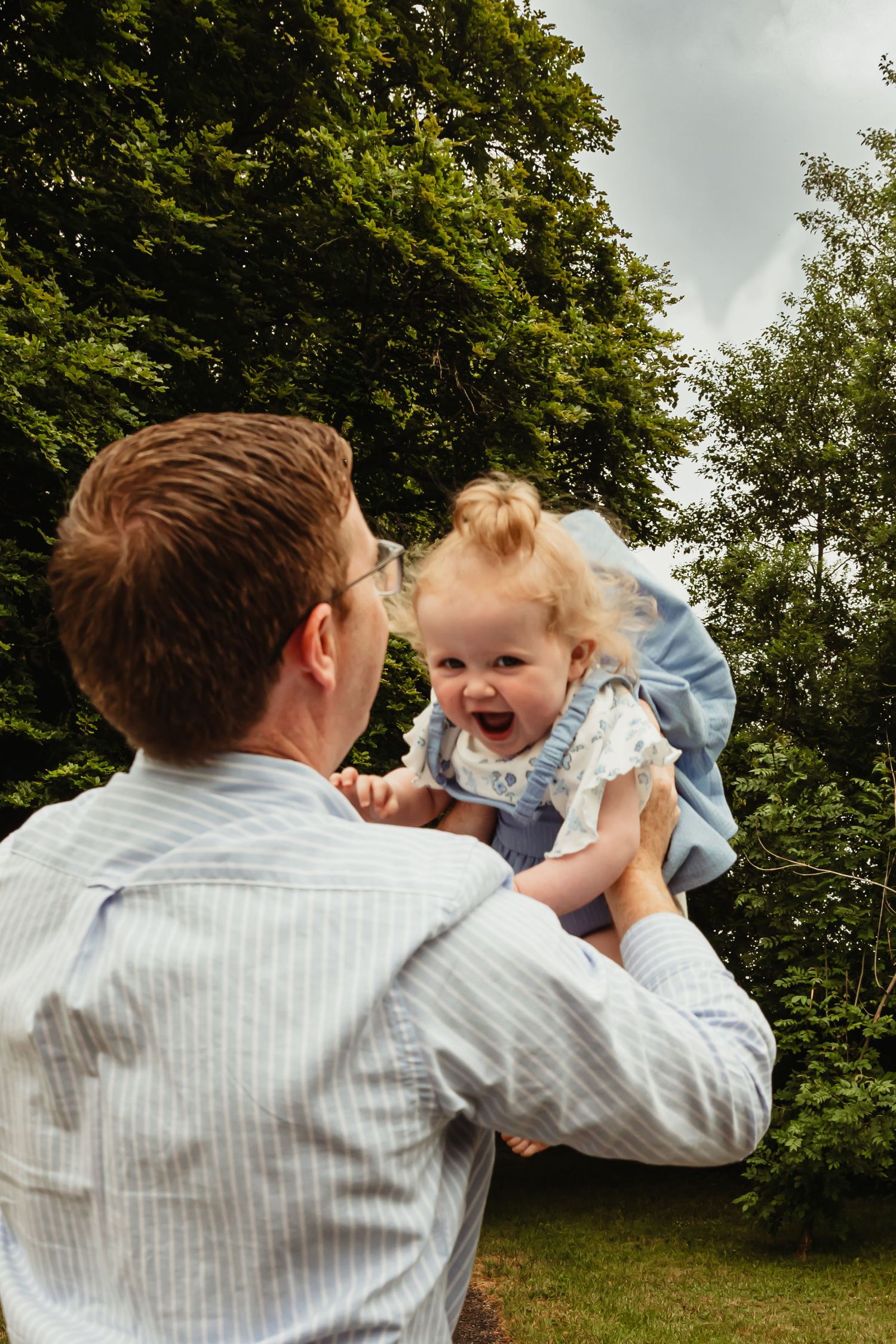 Toddler thrown in air by father
