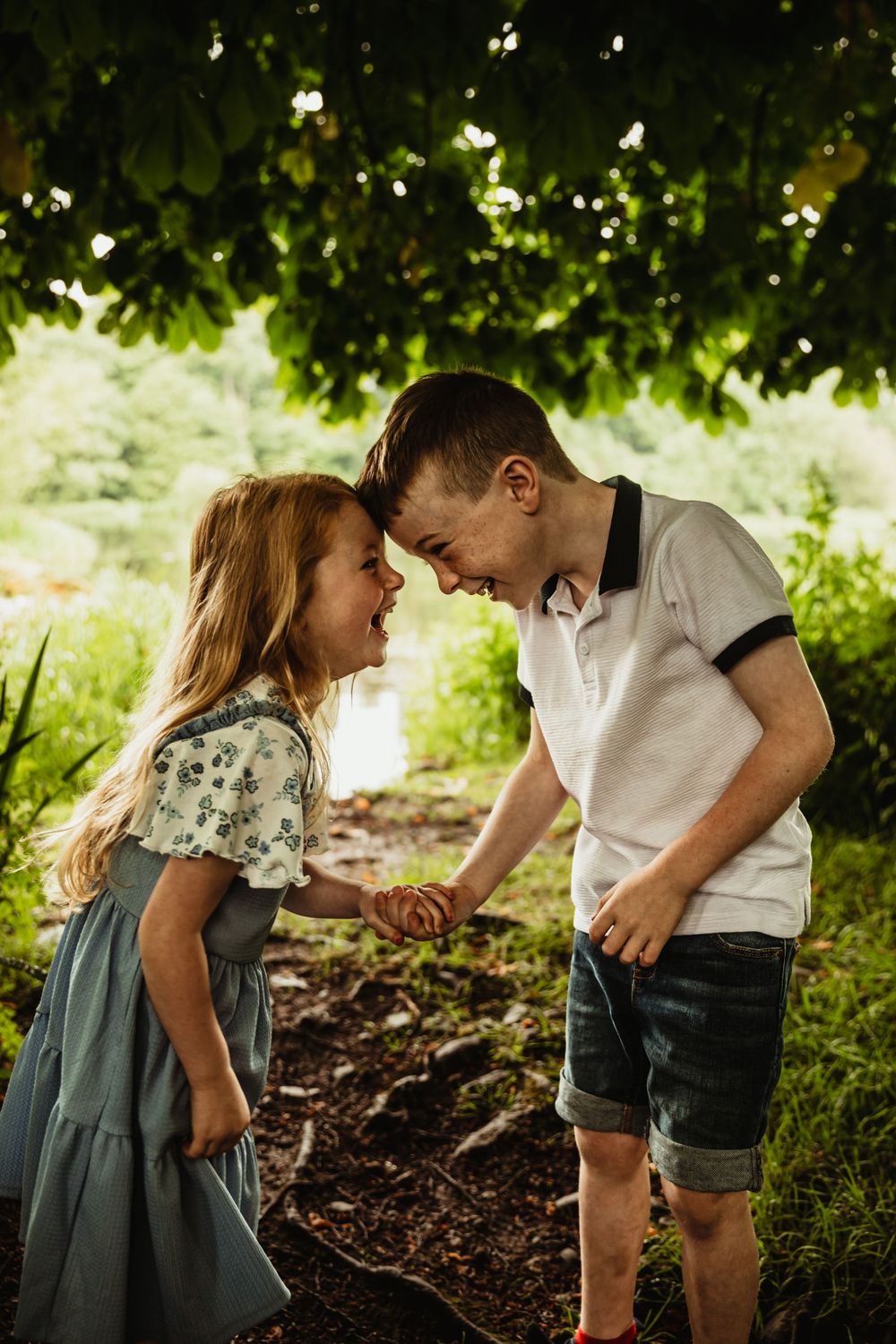 Sister and brother laughing