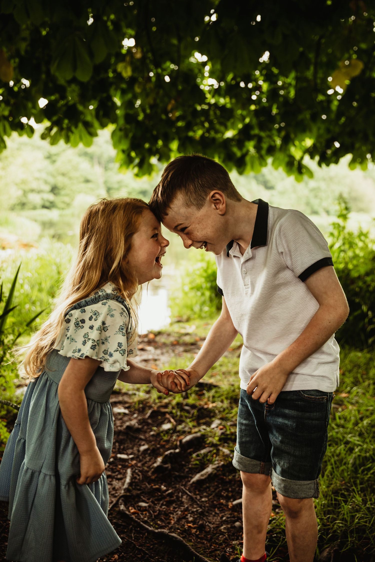 Sister and brother laughing