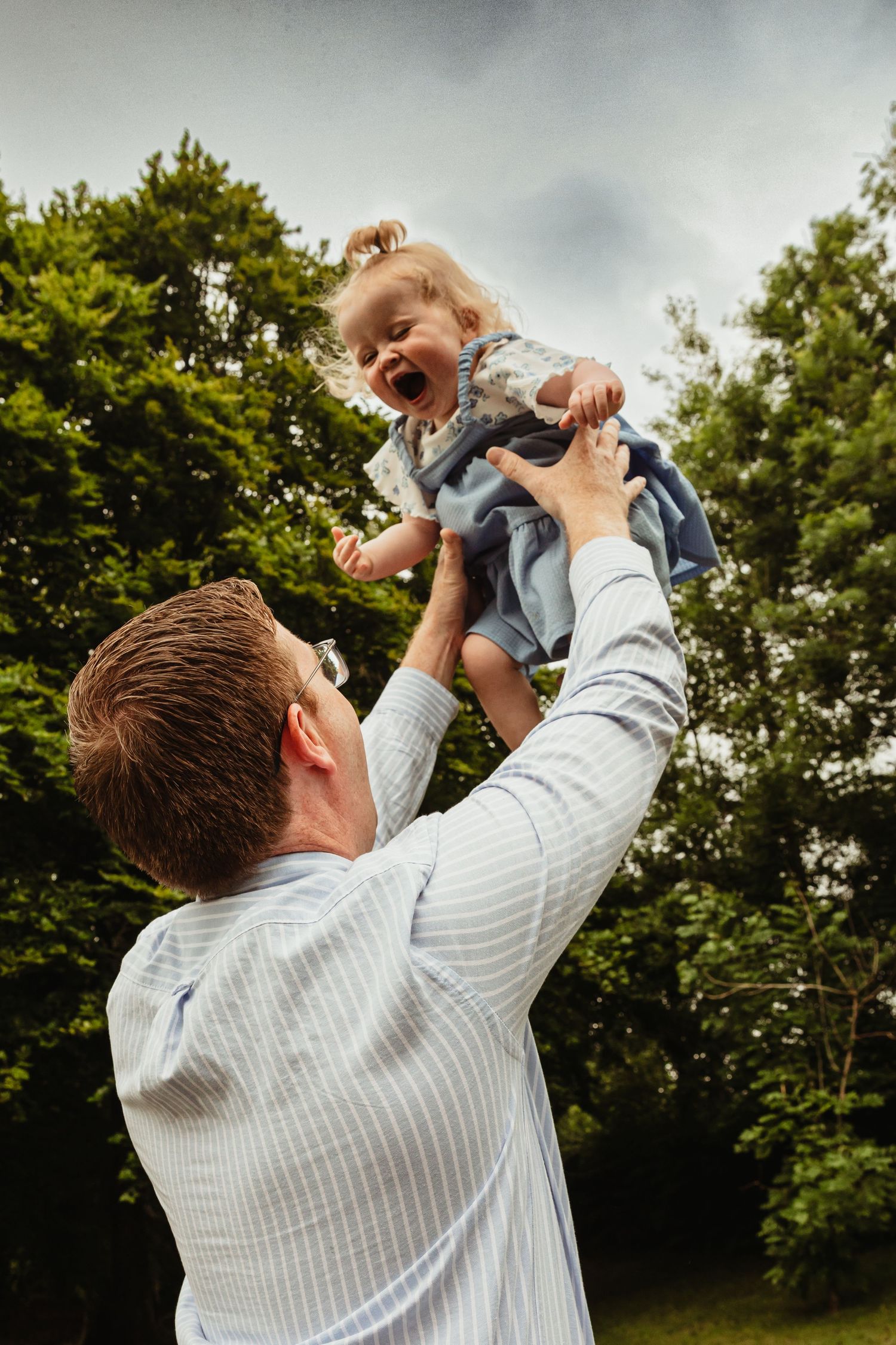 Toddler thrown in the air by father