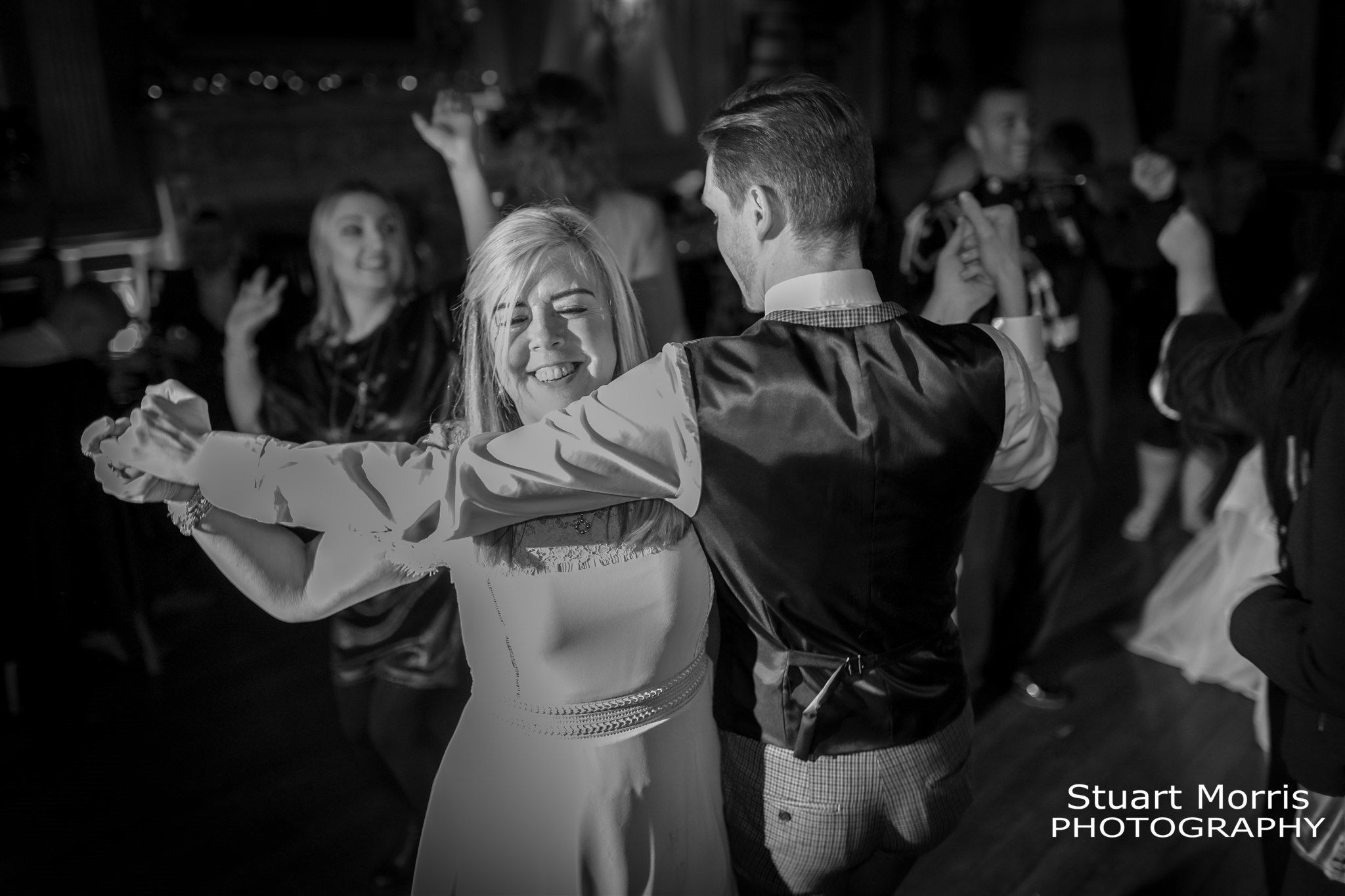 Wedding guests dancing and having fun at Knowsley hall stately home and wedding venue. Liverpool Wedding photographer.
