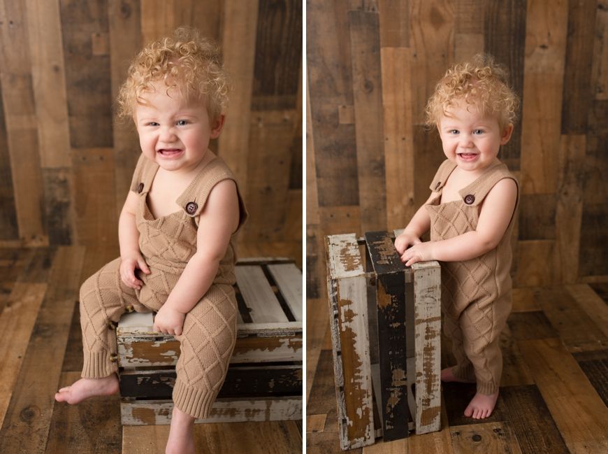 Two photos of a toddler in brown overalls posing with vintage crates against wooden wall.