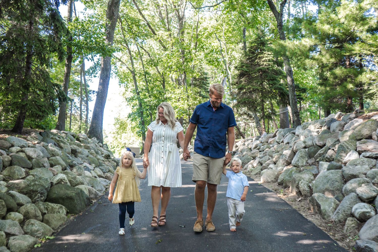 Walking photos of a young family.