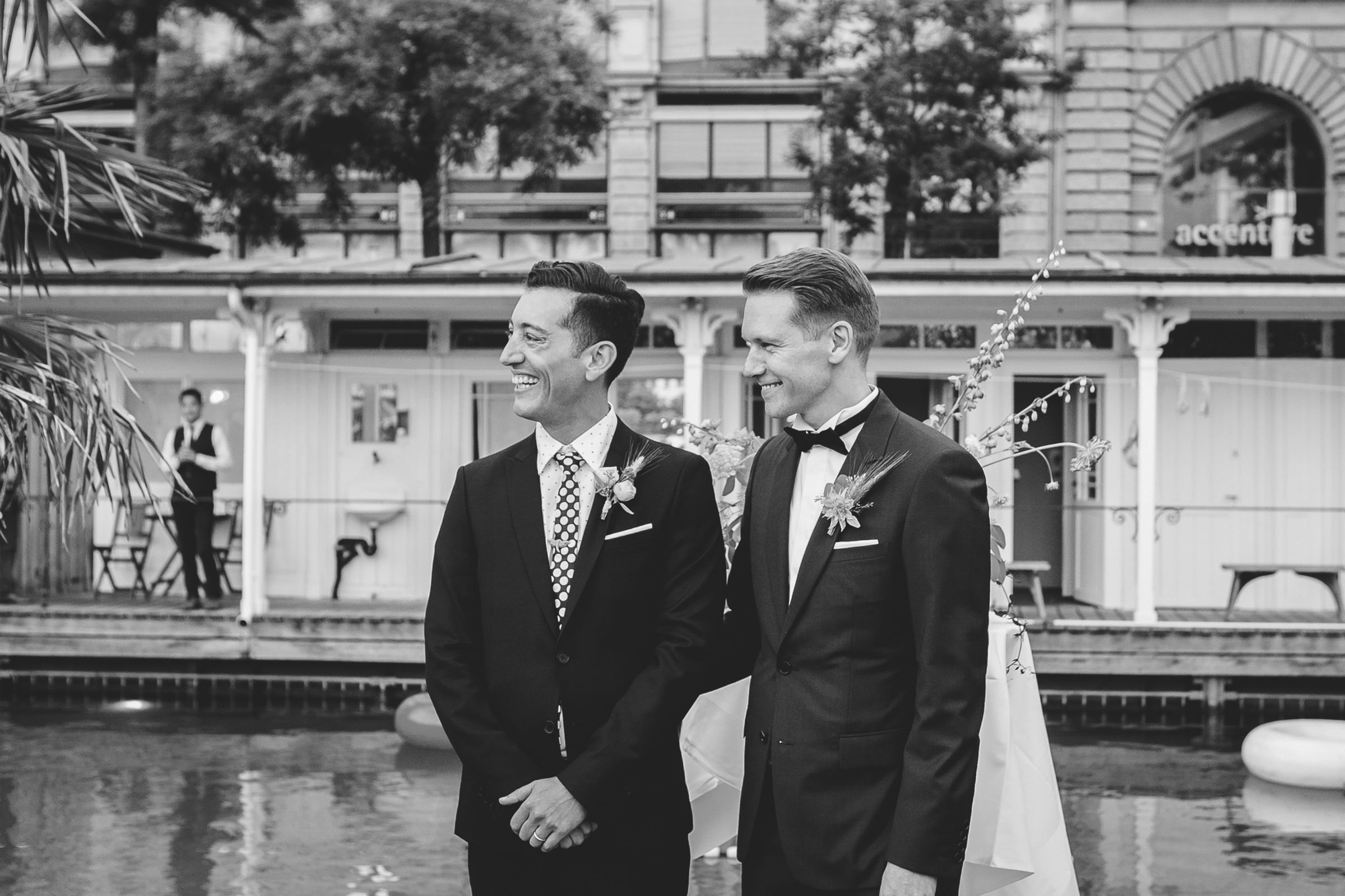 Gay couple standing outdoors and looking at view