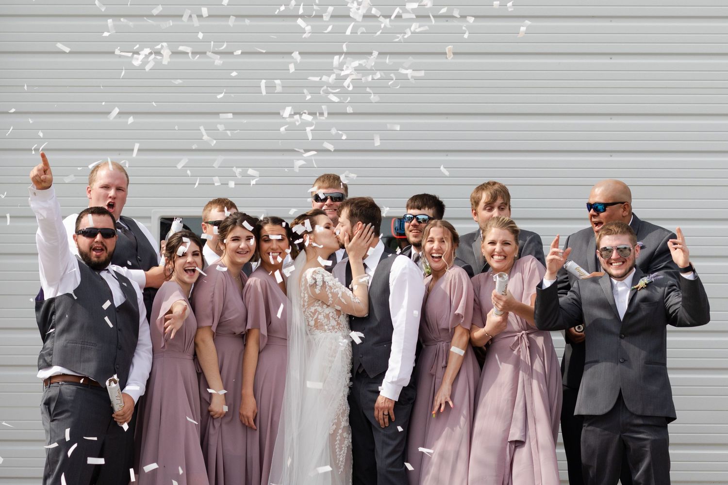 bridal party with confetti