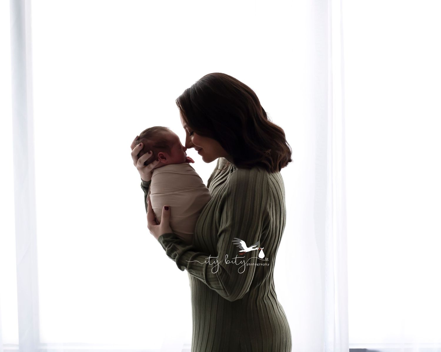 Gorgeous Backlite image of Mama & Son | Baby Boy Newborn Session North Ridgeville Ohio Photographer
