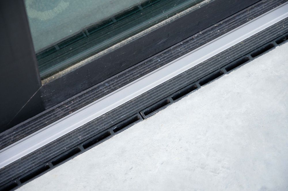 Close-up of a car window frame detail.