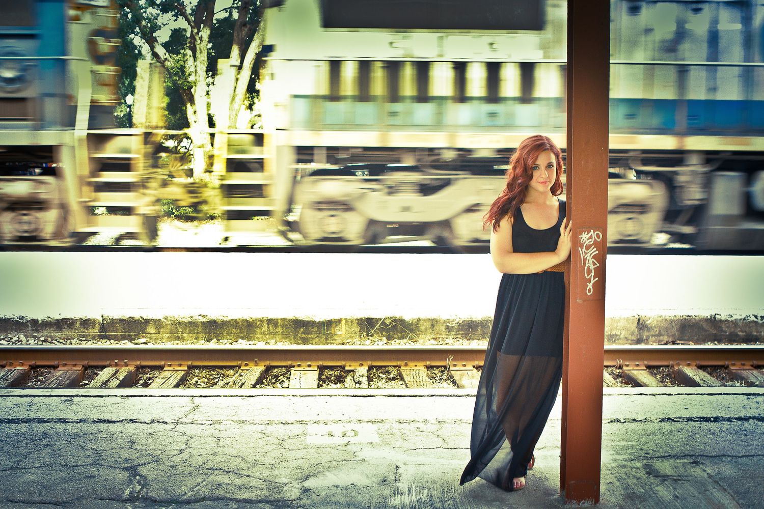 Train passing by at the Winter Park Railway Station senior session