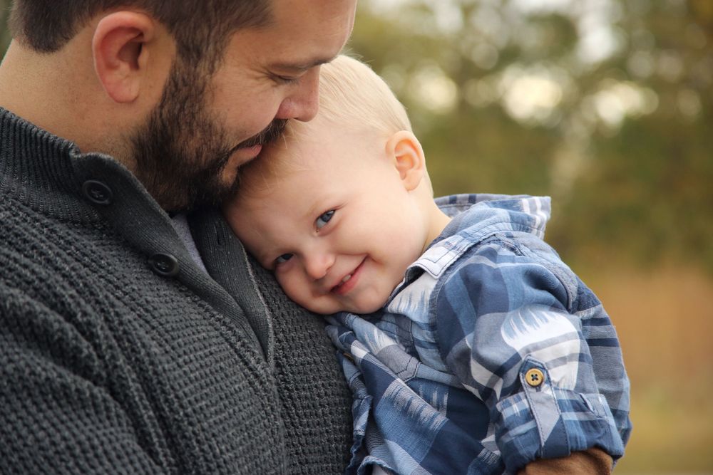 Father holding his one year old son in Grove City.