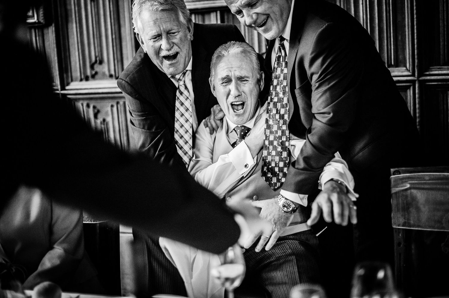 Fun shot of playful older wedding guests