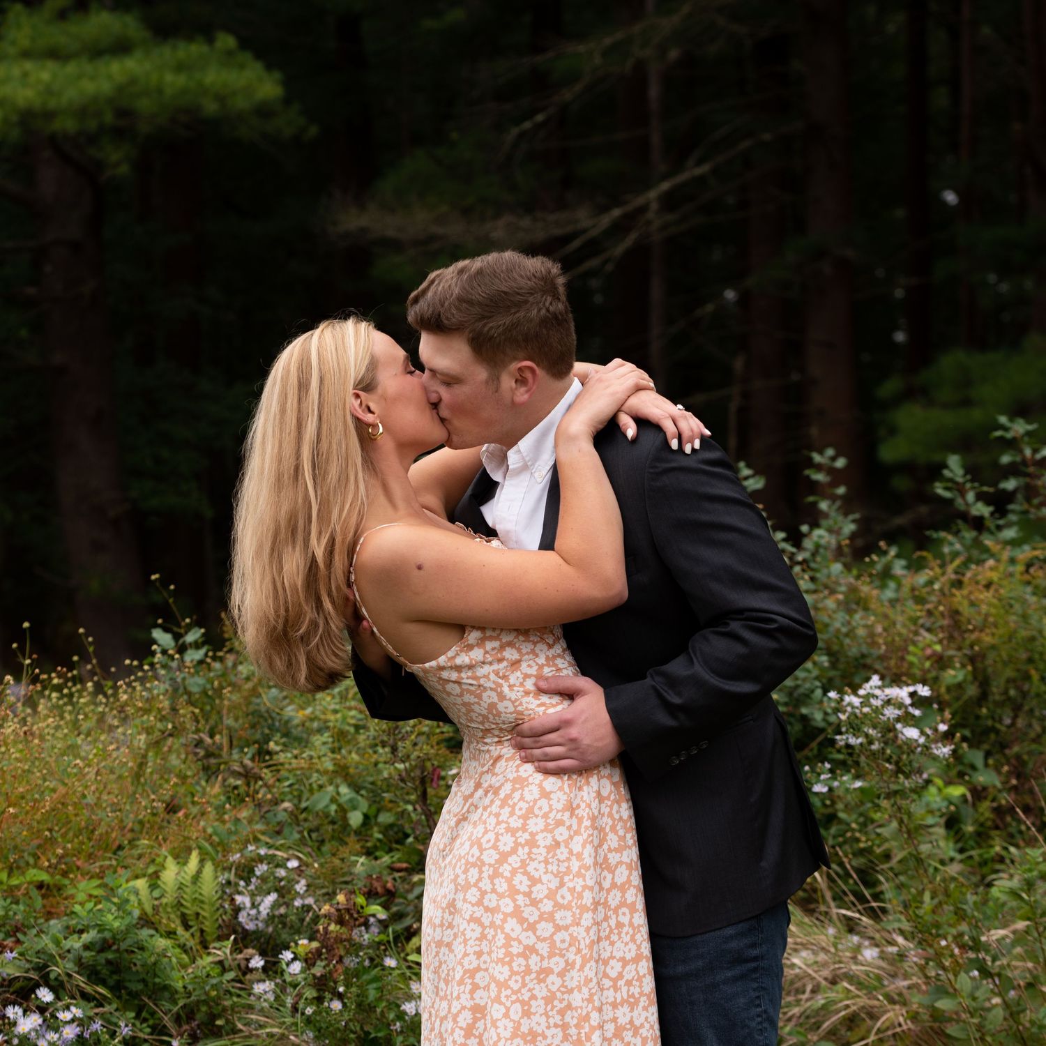 Engagement portraits in Appleton Farms Ipswich couple kisses fall Leah Ramuglia Photography