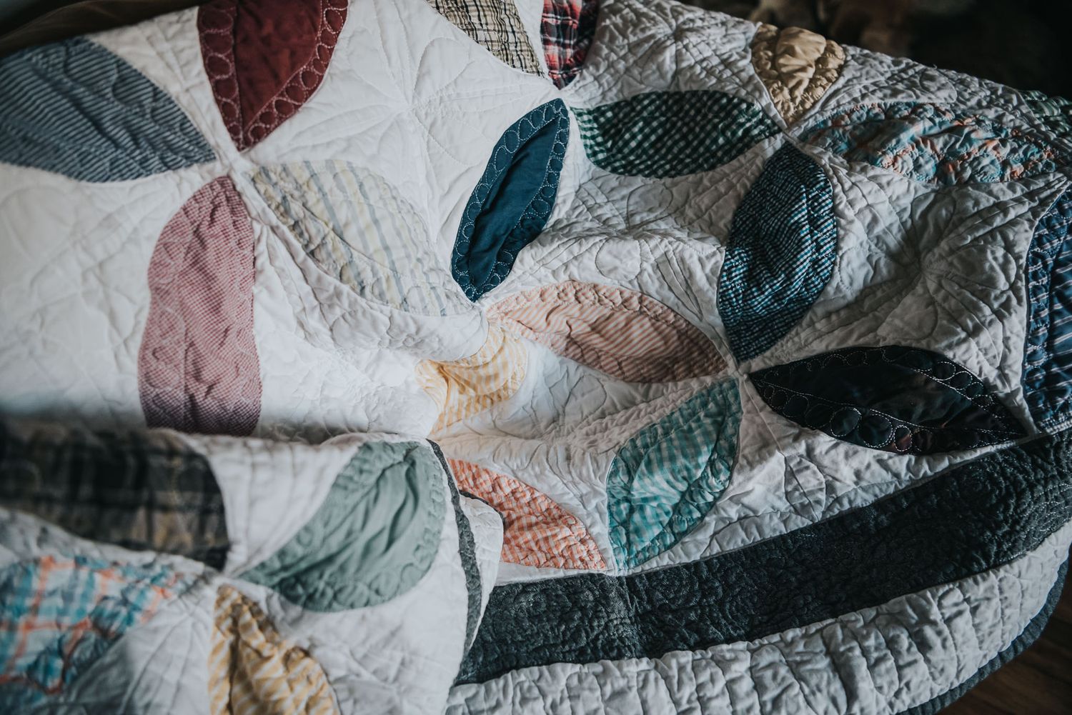 Orange peel quilt made with white fabric and colourful dress shirt fabric.