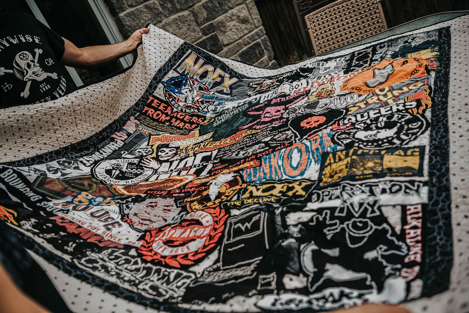 Collage t-shirt quilt made with punk concert t-shirts.