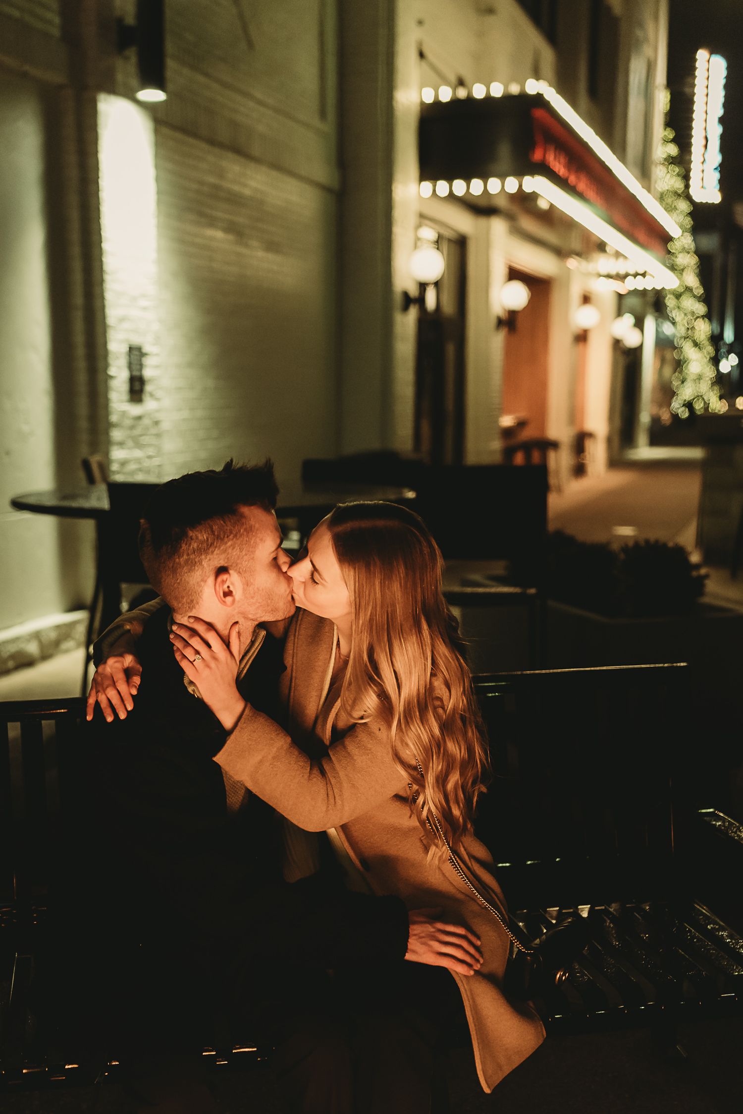 newly engaged couple celebrates at Newport on the levee