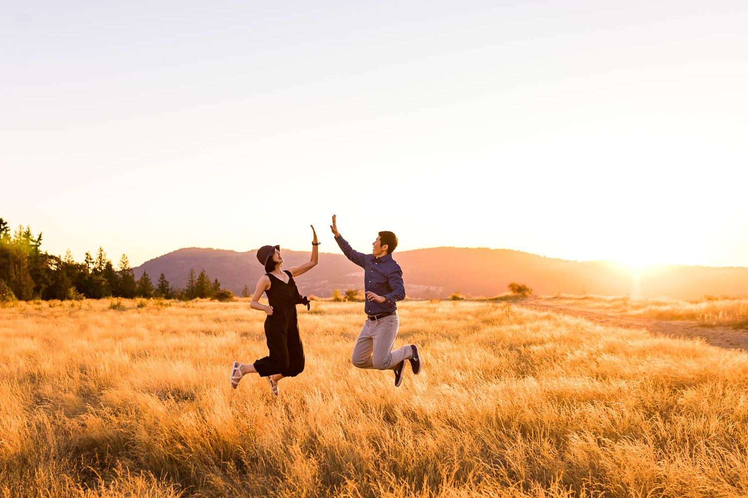 Brother and sister high five at Issaquah Highlands by Redmond Family Photographer