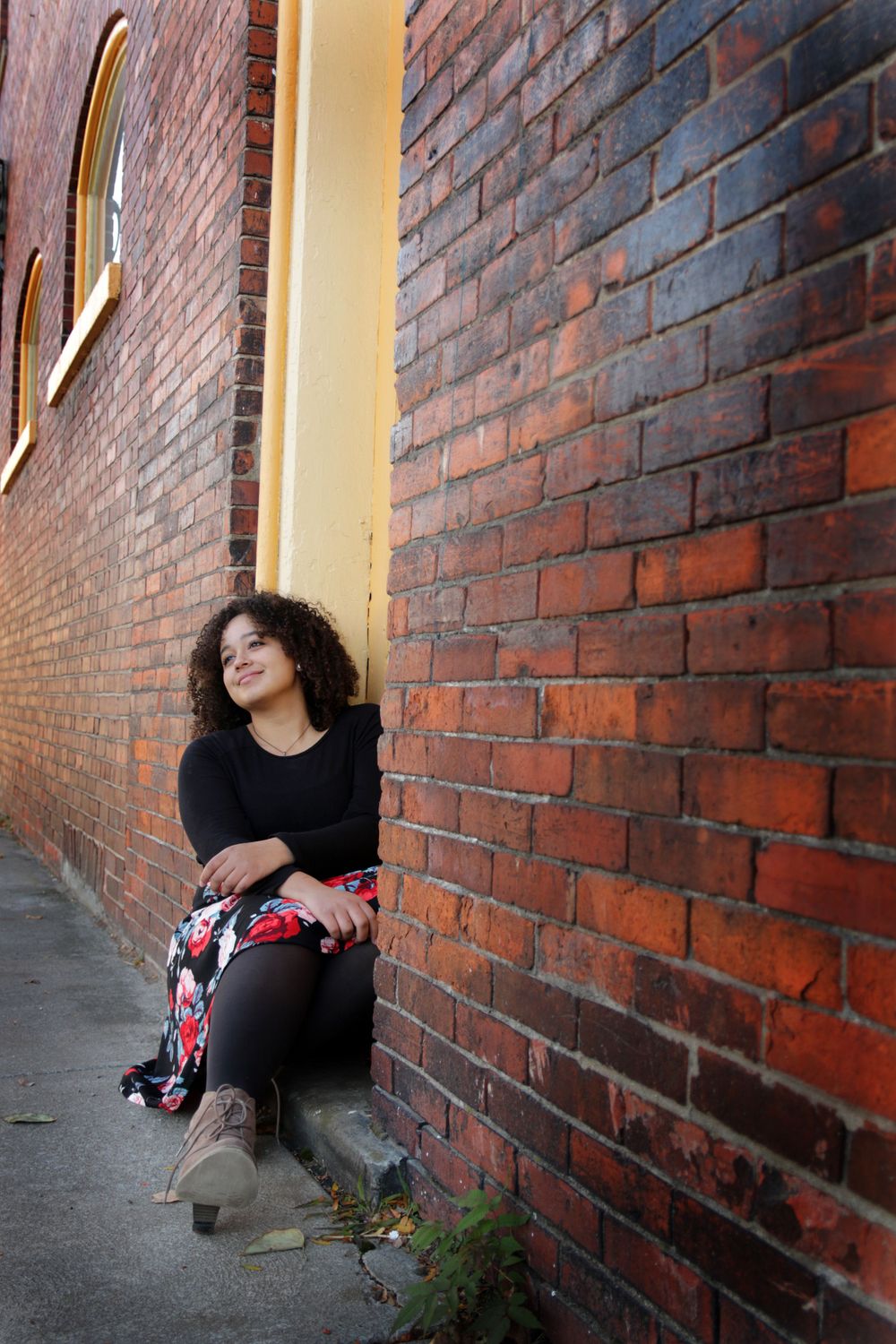 high school senior on location city urban brick portraits