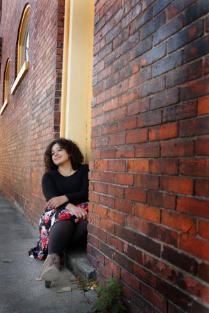 high school senior on location city urban brick portraits