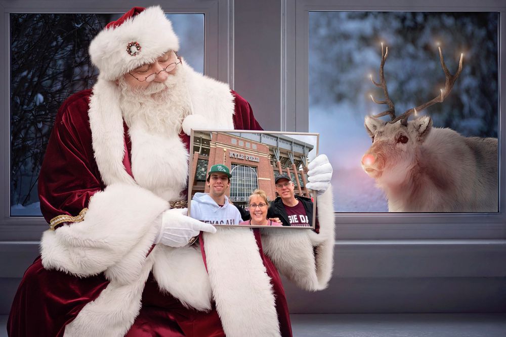 Santa holds up a family photo.