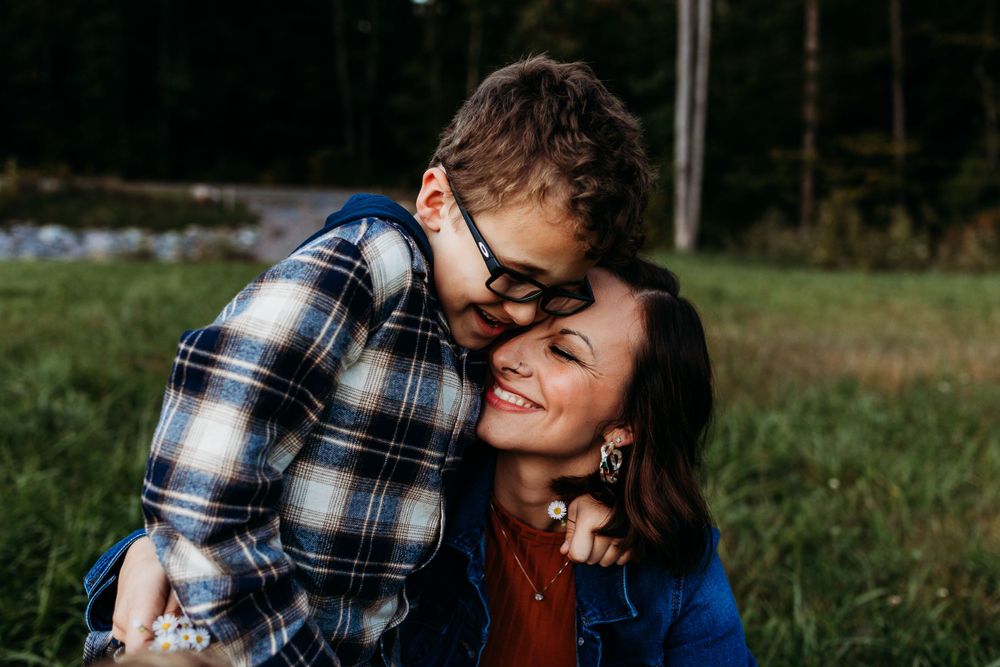 Candid couple moment captured during outdoor photography session.