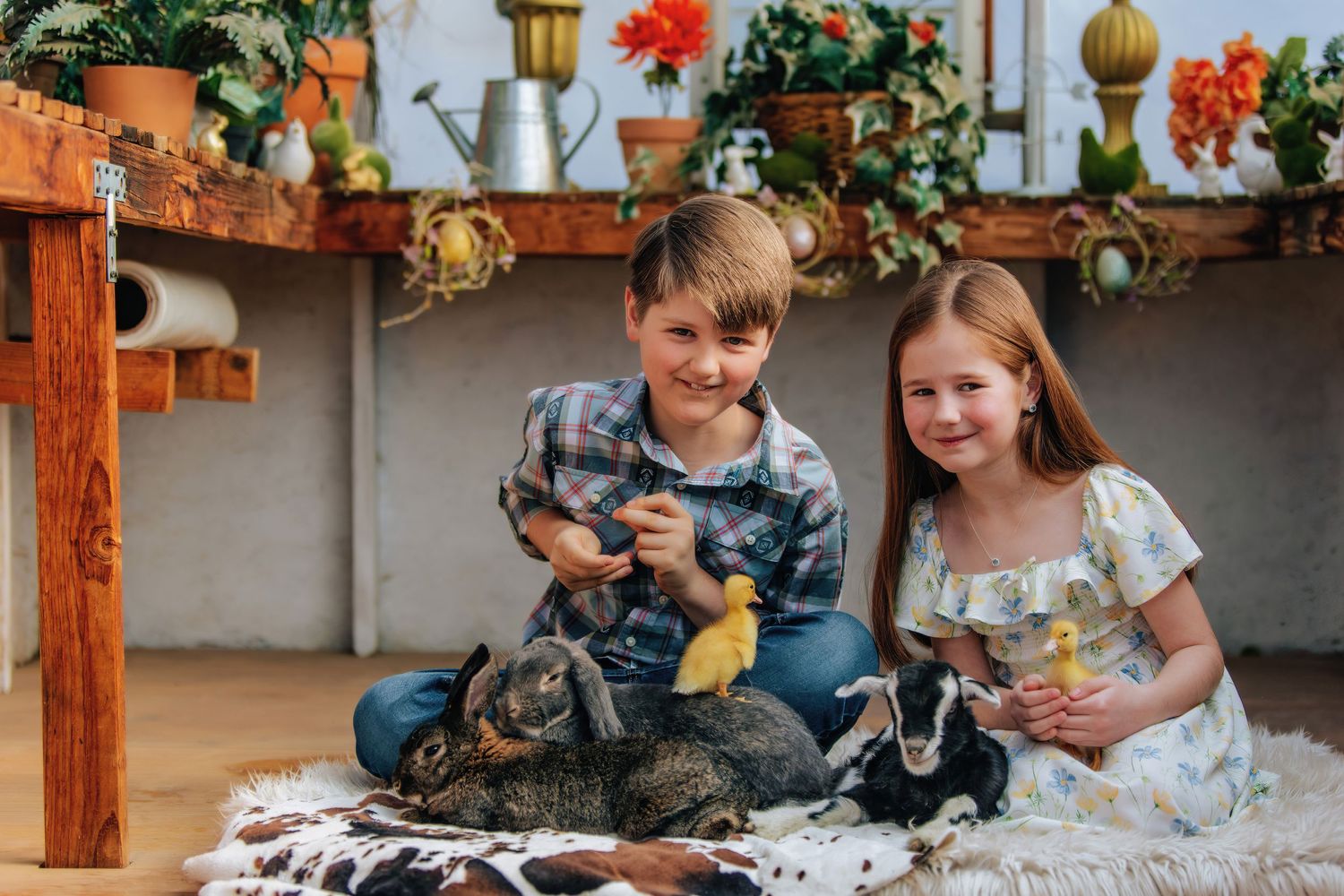 spring animals with children in greenhouse