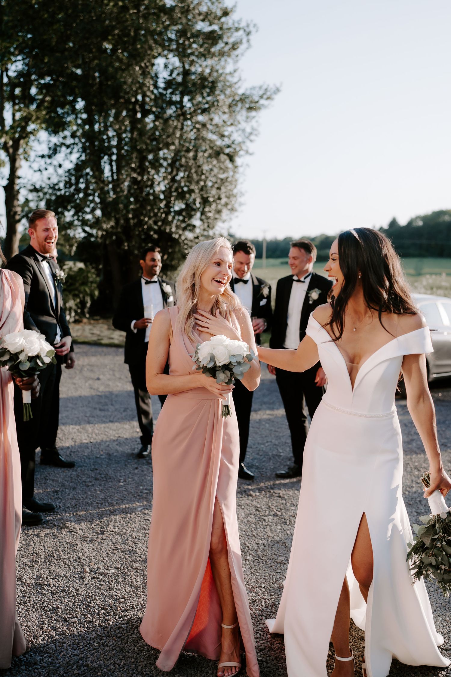 bride-and-bridesmaid-laughing-stockton-house-wedding-shropshire