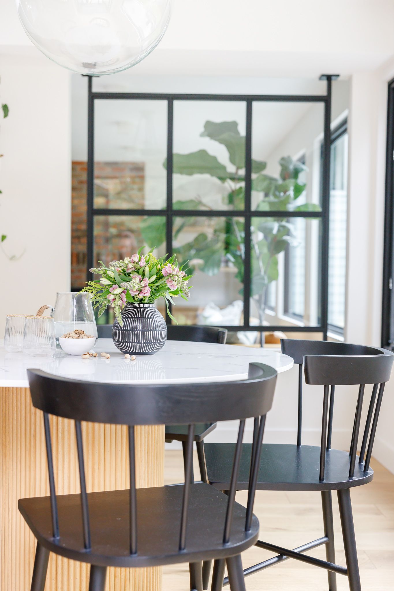 H. Bero Interior Design photos kitchen table with window to livingroom in Bellevue, WA