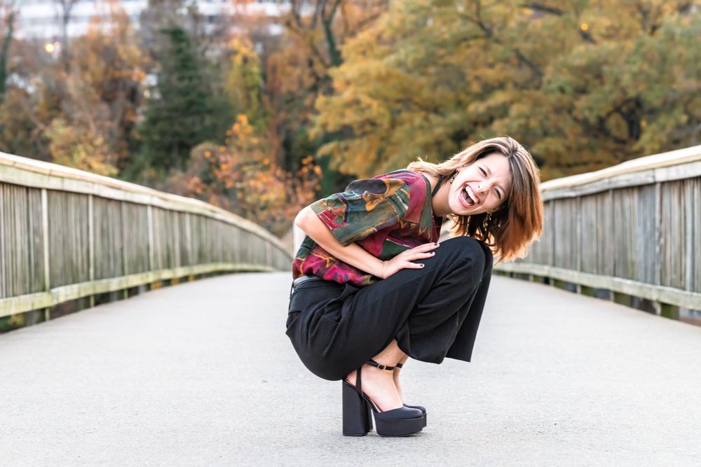Senior on bridge in Arlington, Virginia. Beautiful fall day.
