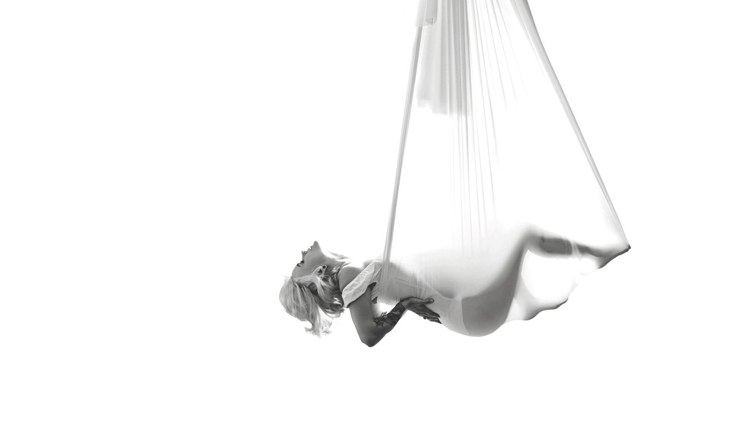 Luxury maternity session in aerial silk in Lawrence KS