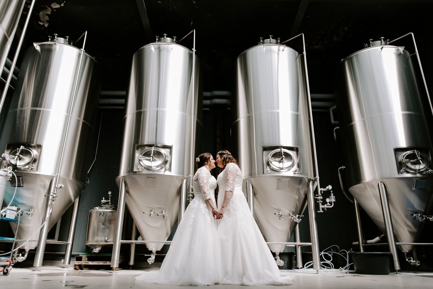 2 ladies on wedding day infant of Wylam Brewery beer tank