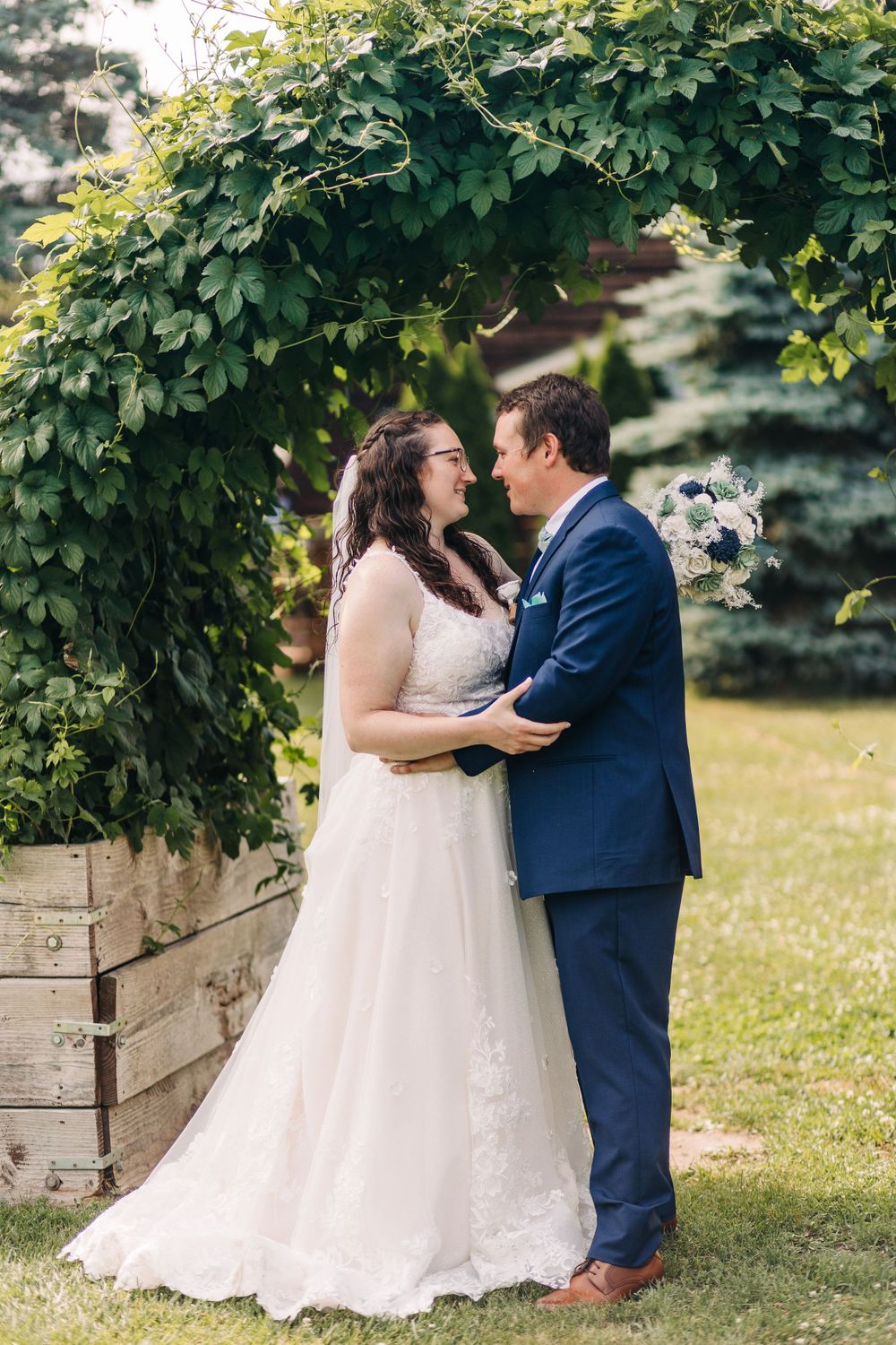 Fenton Michigan Wedding Photography. Bride and Groom natural light wedding portraits.
