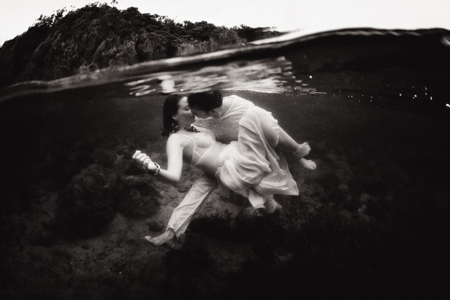 Authentic, storytelling editorial portrait underwater photography capturing real moments with depth, emotion, and a strong visual narrative