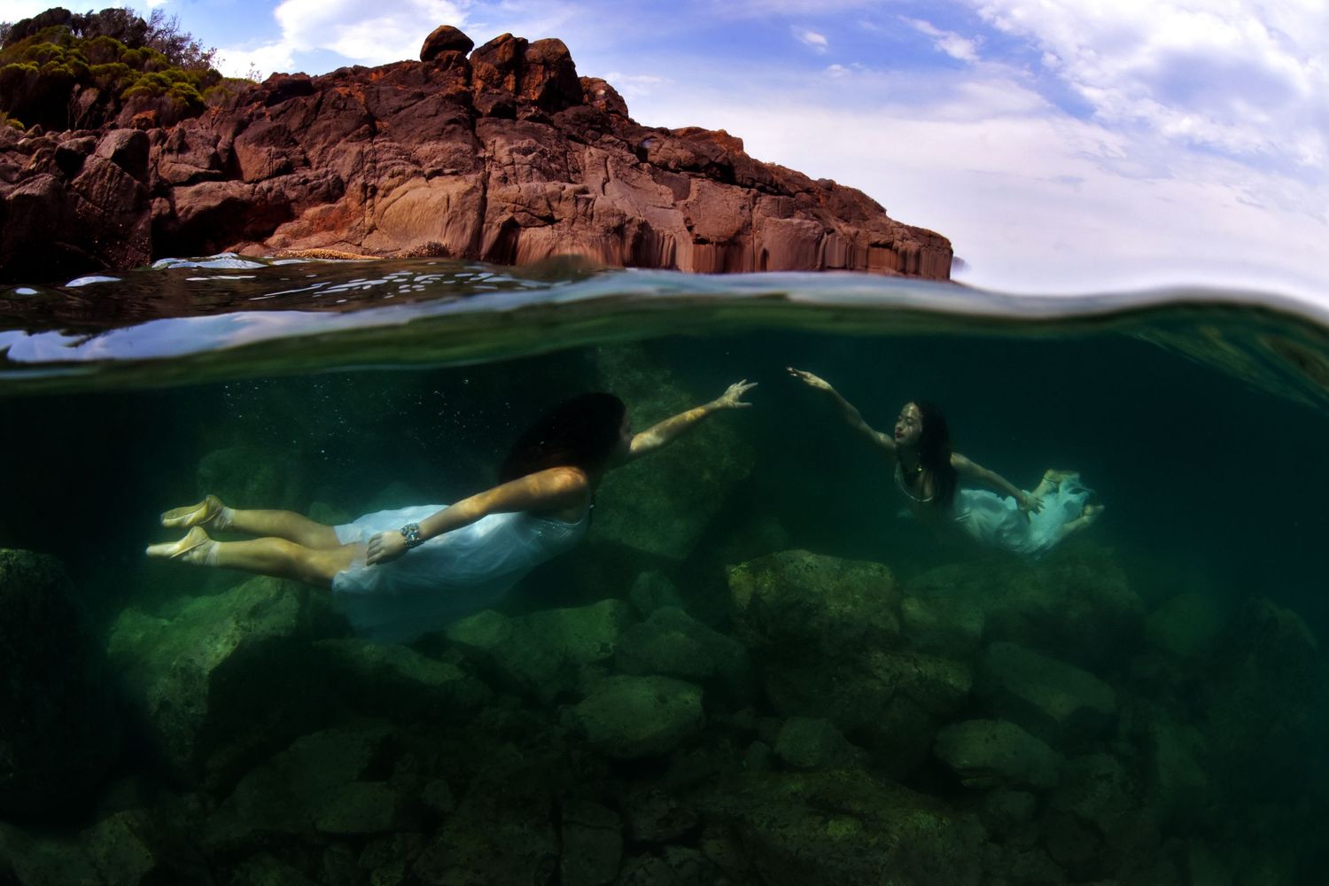 Authentic, storytelling editorial portrait underwater photography capturing real moments with depth, emotion, and a strong visual narrative